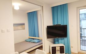 Apartament Kapitalny przy porcie w Kołobrzegu z rowerownią i placem zabaw